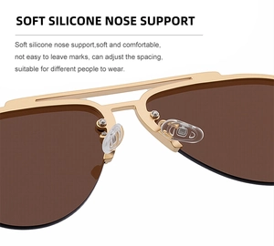 Detail of adjustable soft silicone nose pads on gold metal frame aviator sunglasses