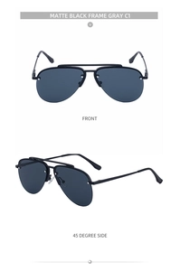 Detail of matte black double-bridge aviator sunglasses with gray UV protection lenses