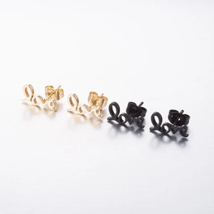 Minimalist stainless steel Love stud earrings set in polished gold and black finishes