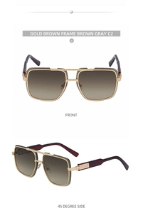 Close-up of gold brown double-bridge square sunglasses with textured frames and gradient lenses
