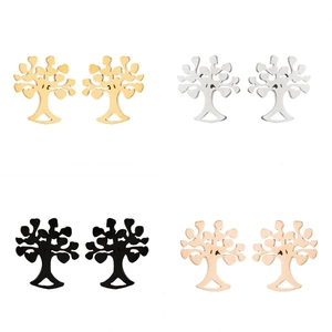 Close-up of tree of life stud earrings in gold, silver, black, and rose gold finishes