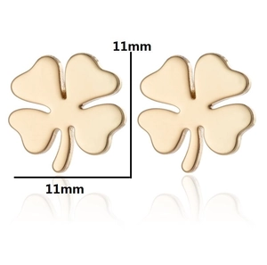 Detailed view of polished golden clover stud earrings with 11mm dimensions and mirror reflection