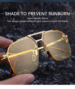 Detailed close-up of retro semi-rimless aviator sunglasses with gold frames and yellow lenses