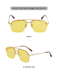 Close-up of gold semi-rimless pilot sunglasses with yellow lenses and tortoise earpieces