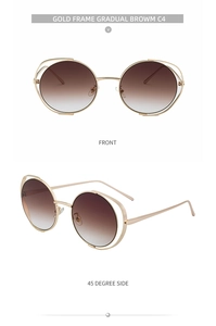 Detail view of gold hollow metal round frame sunglasses with gradient brown lenses
