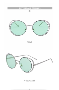 Detail of silver hollow round metal frame sunglasses with light green lenses and double bridge