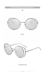Detail view of silver metal round frame sunglasses with hollow double-rim design