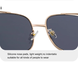 Détails des plaquettes de nez en silicone sur lunettes de soleil en métal doré confort