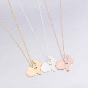 Minimalist rabbit necklaces with hollow heart detail in gold, silver and rose gold finishes