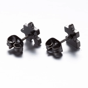 Minimalist black stainless steel puzzle piece stud earrings with a brushed metal finish