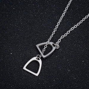 Minimalist silver horseshoe stirrup necklace with double pendant on stainless steel chain