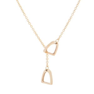 Detailed view of a gold horseshoe Y-necklace featuring dual stirrup pendants on a fine chain