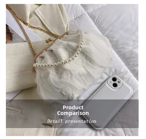 Size comparison of white lace cloud bag with pearl handle and golden chain strap