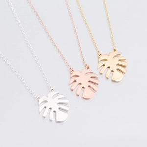 Tropical palm leaf pendant necklace in gold, rose gold and silver stainless steel set