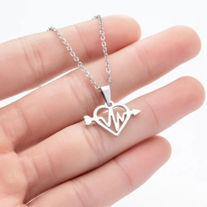Detailed close-up of heart-shaped ECG heartbeat pendant with arrow in silver finish