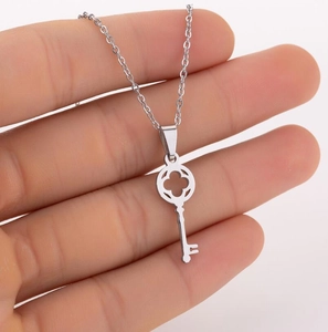Elegant silver 18K gold plated stainless steel key necklace with clover cutout pendant