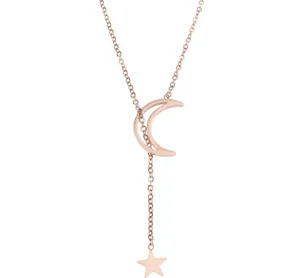 Detail of rose gold Y-necklace with hollow moon pendant and dangling star charm