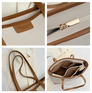 Macro details of litchi texture leather, golden zippers, and inner pockets of the tote bag