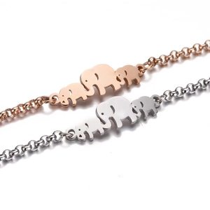 Detail of cute elephant charm bracelets in rose gold and silver finishes on O-chain