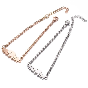 Detail of adjustable elephant pendant bracelets in rose gold and silver finish