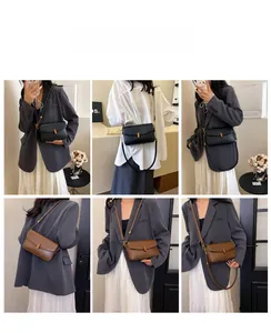 Détail de sacs à bandoulière élégants en noir et marron avec boucles en métal doré chic