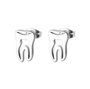 Detailed view of silver tooth-shaped stud earrings with polished stainless steel finish