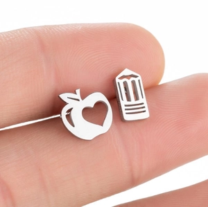 Asymmetric stainless steel apple and pencil stud earrings with silver finish