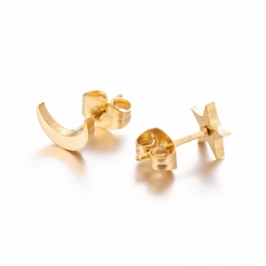 Gold asymmetric star and moon stainless steel stud earrings set on a white background