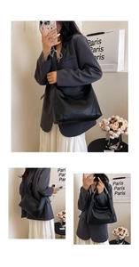 Detailed views of a black litchi pattern leather crescent tote bag with silver chain