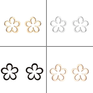 Detail of hollow origami flower earrings in gold, silver, black, and rose gold plating