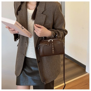 Deep brown litchi pattern doctor bag with rivet decor and adjustable crossbody strap