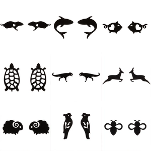 Set of 9 pairs of black animal silhouette stud earrings featuring hollow animal designs