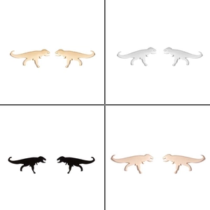 Detailed view of Tyrannosaurus Rex earrings in gold, silver, black, and rose gold finishes