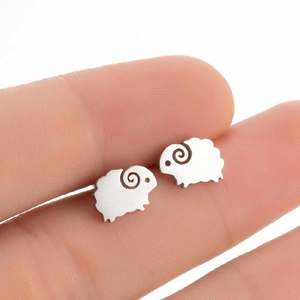 Minimalist cute little sheep stainless steel stud earrings shown held between fingers