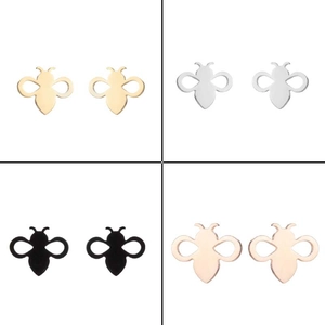 Detail view of bee shaped stud earrings in gold silver black and rose gold finishes