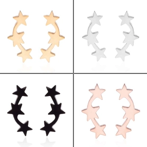 Detail of five-star curved crawler earrings in gold, silver, black and rose gold finishes