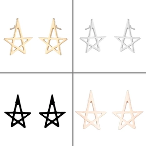 Macro view of minimalist hollow star-shaped earrings in gold silver black and rose gold finish