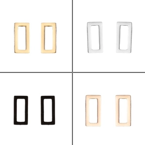 Detailed view of geometric hollow rectangular earrings in gold silver black and rose gold