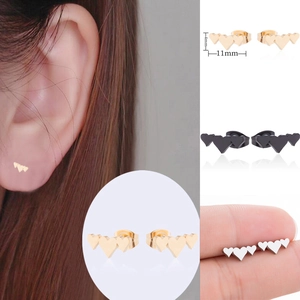 Close-up of triple heart stud earrings in gold black silver with size dimensions