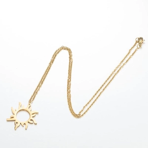Minimalist hollow sun pendant necklace in golden stainless steel with bohemian style