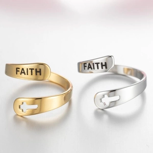 Adjustable cross ring set in gold and silver with FAITH engraving and cutout design