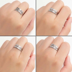 Set of minimalist silver stainless steel rings with engraved inspirational English phrases
