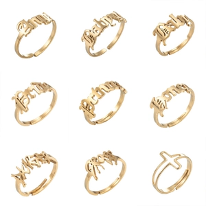 Set of 9 gold gothic rings with Angel and King cut-out letters and adjustable bands