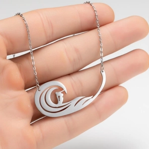 Handheld silver ocean wave pendant necklace in stainless steel with polished O-chain