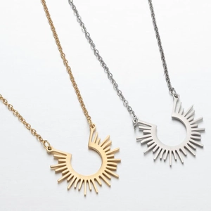Baroque sunburst pendant necklaces in gold and silver finish with sleek U-shaped horseshoe chain