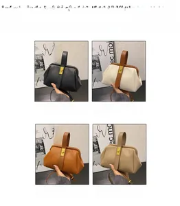 Detail view of four vintage shell handbags with litchi texture and metal turn-lock closures