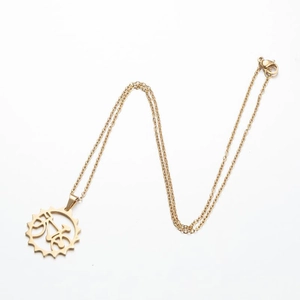 Gold stainless steel necklace featuring a hollow bicycle gear pendant with a delicate chain