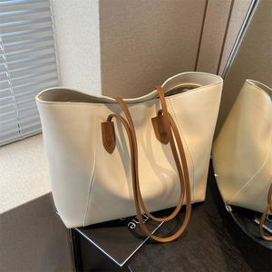Large cream tote bag with brown straps for women, minimalist faux leather shoulder bag