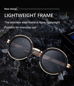 Vue détaillée de lunettes de soleil rondes polarisées avec monture inox sur roche sombre