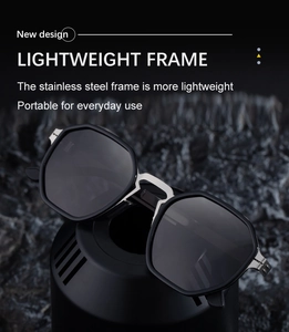 Detail of lightweight stainless steel hinge and bridge on black polarized sunglasses